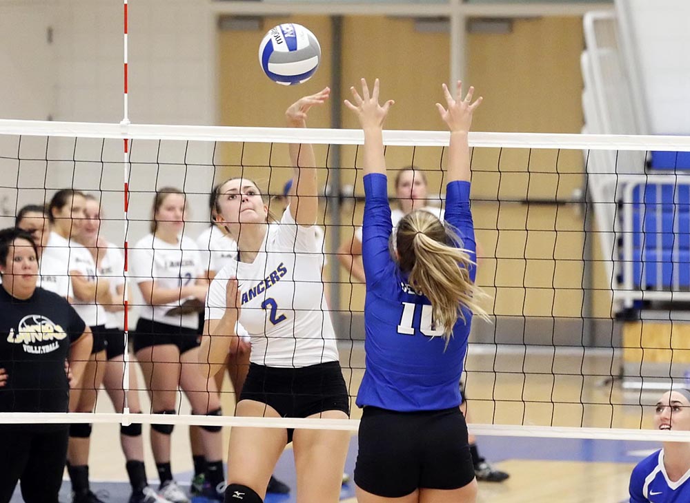 Volleyball Sweeps Lasell in Home Opener