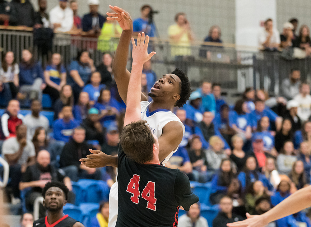 Men's Basketball Upends Lasell